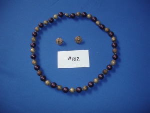 Set #102  Deep purple and gold necklace with intricate gold earrings