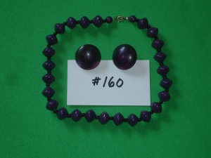 Purple bead necklace with matching earrings.